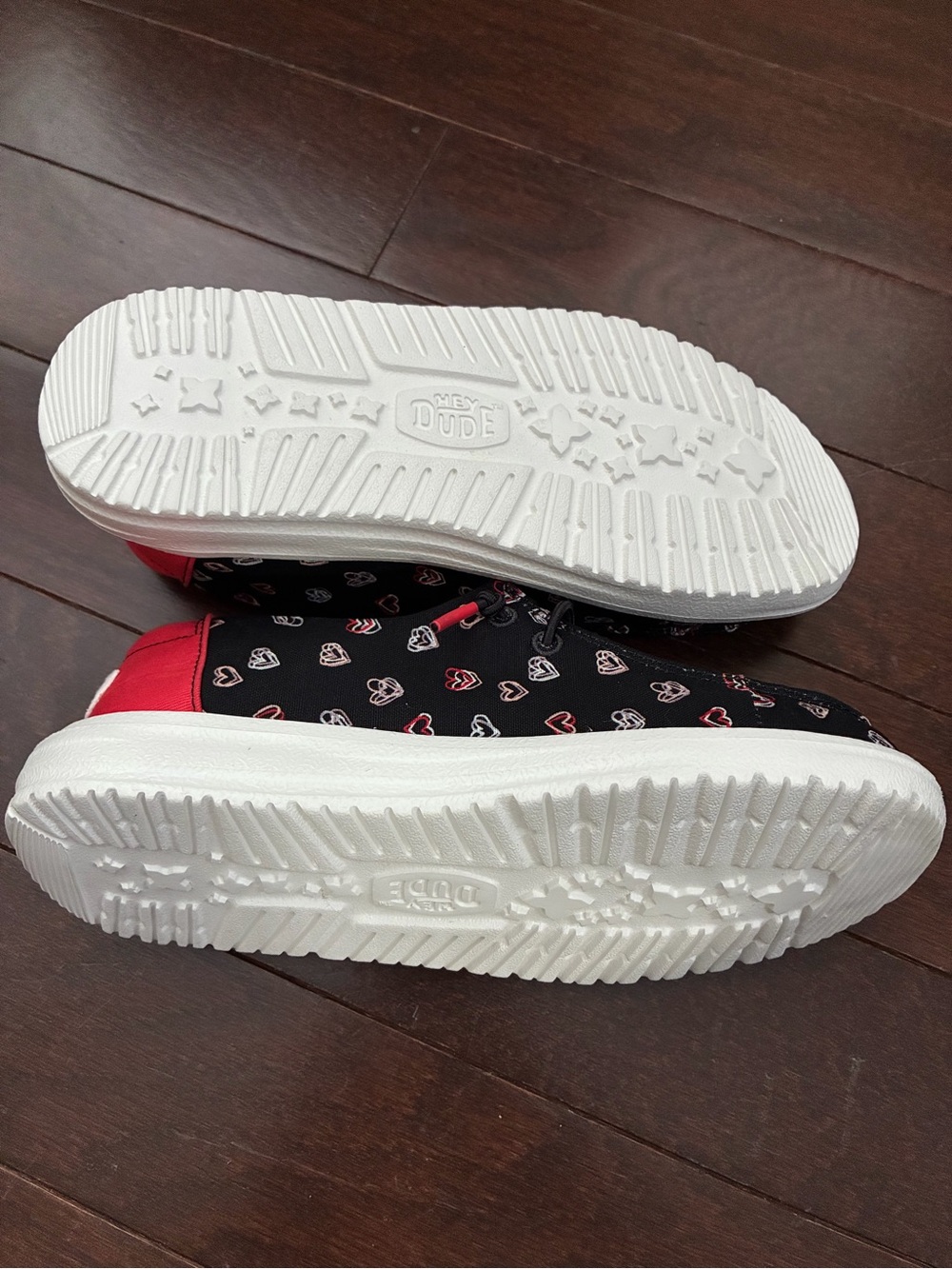 Hey Dude Kids Black Slip-On Sneakers with Red & White Heart Print - Picture 2 of 3